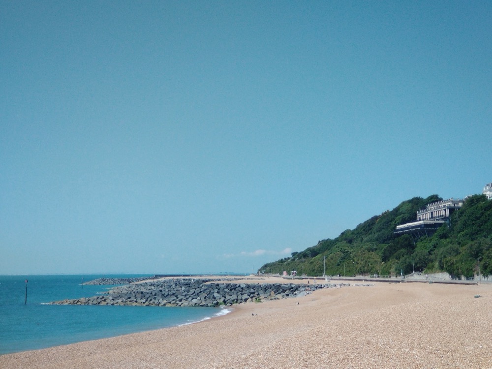 Folkestone's shingle beach and the Leas Cliff Hall, built into the cliff